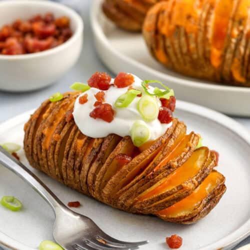 Hasselback Potatoes Recipe made with sour cream , bacon and green onions
