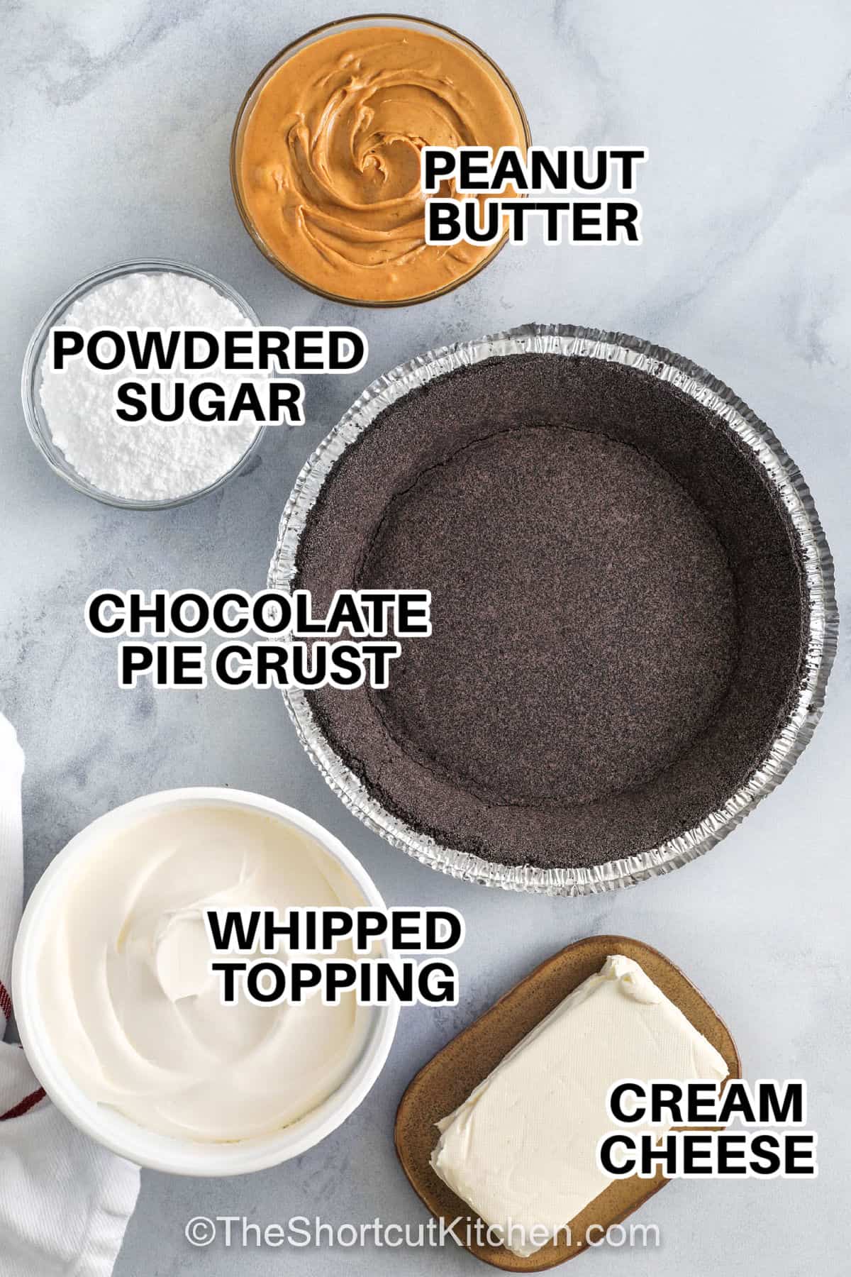 peanut butter , powdered sugar , chocolate pie crust , whipped topping , cream cheese with labels to make Peanut Butter Pie