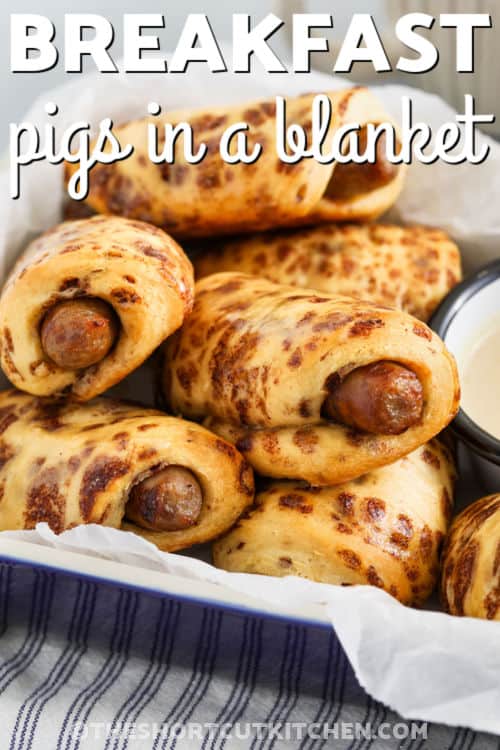 close up of Breakfast Pigs in a Blanket with a title