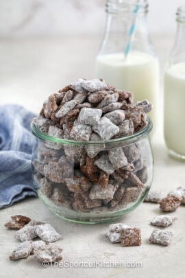 a container with prepared muddy buddies