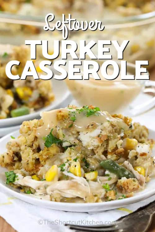 Leftover turkey casserole makes the most of post-holiday ingredients, turning them into a warm, flavorful meal everyone will love. Juicy turkey, tender vegetables, and rich gravy bake beneath a creamy mashed potato layer topped with buttery stuffing. The result is a golden, comforting dish that’s easy to make, satisfying to eat, and perfect for cozy family dinners any night of the week. #theshortcutkitchen a serving of leftover turkey casserole with gravy with a title