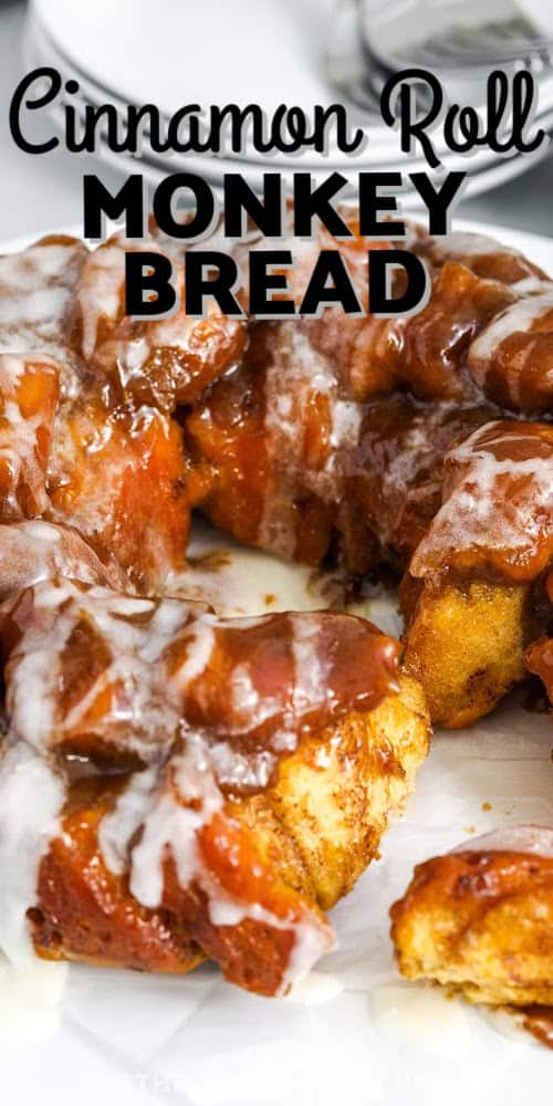 Cinnamon roll monkey bread is the ultimate shortcut recipe made with refrigerated rolls and a rich caramel cream sauce. Each bite is soft, gooey, and sweet, with a hint of cinnamon. This easy, pull-apart dessert is topped with icing for a perfectly glazed finish. It’s the best treat to make for breakfast, brunch, or a last-minute holiday gathering. You’ll be amazed at what you can do with so little effort. #theshortcutkitchen Cinnamon Roll Monkey Bread with a title