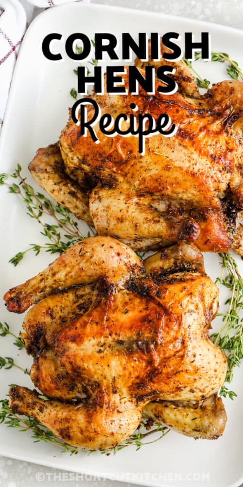This Cornish hens recipe makes an easy and elegant dinner that’s perfect for any holiday or special meal. These small, juicy birds roast up beautifully with golden, crispy skin and tender meat that melts in your mouth. Whether it’s Thanksgiving, Christmas, or a cozy Sunday dinner, this baked favorite adds a touch of charm and flavor to the table that everyone will love. Simple ingredients and big flavor make this dish a keeper. #theshortcutkitchen Baked cornish hens on a serving platter with thyme with a title