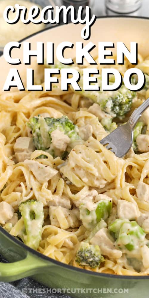 creamy Chicken Alfredo with Broccoli in a pot with a fork
