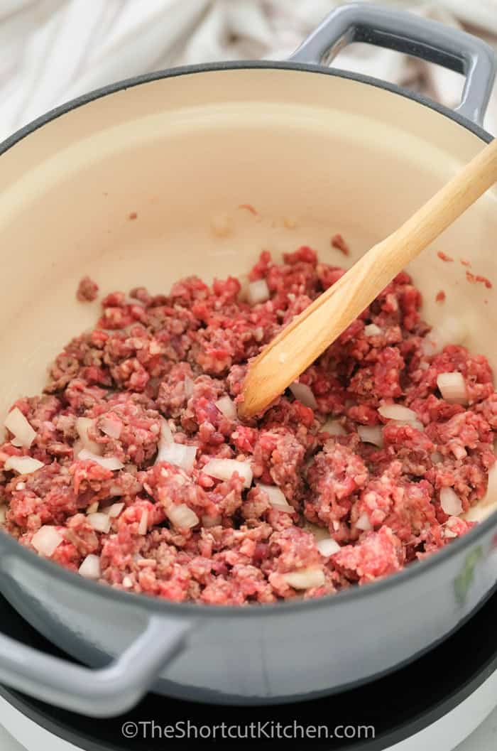 Make a big pot of easy chili with ground beef, kidney beans, diced tomatoes, and tomato sauce for a thick, hearty bowl. This easy beef chili is simple, affordable, and perfect for meal prep. Simmer uncovered to thicken naturally, then customize with toppings like cheddar, onions, and hot sauce. Store leftovers for lunches and freeze portions for fast weeknight meals. #theshortcutkitchen cooking ground beef in a pot