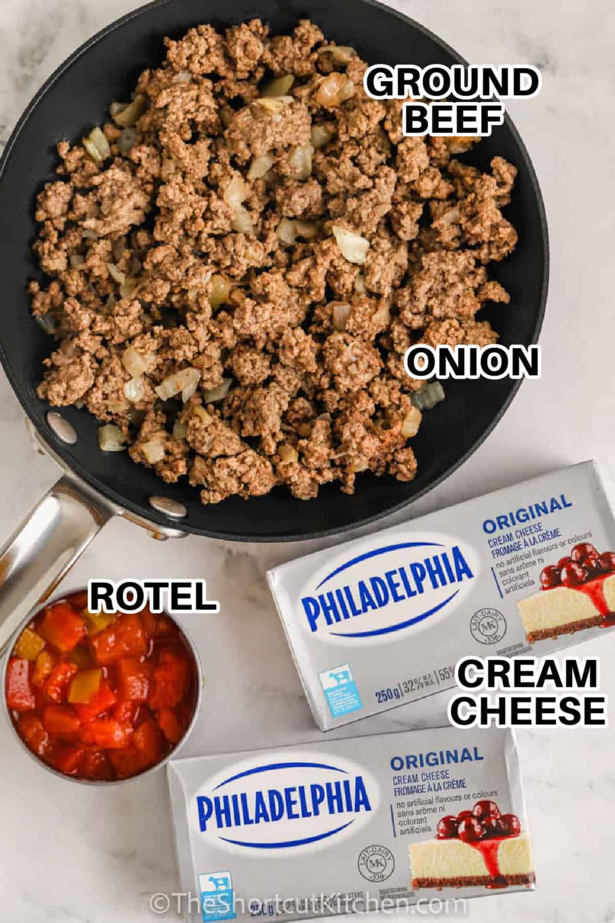 This cream cheese Rotel dip recipe is a cheesy, scoopable sausage Rotel dip made easy in the slow cooker. Use mild or hot Rotel to control the heat, and cube the cream cheese so it melts faster. Add shredded cheddar to thicken it up, or stir in jalapeños for extra kick. Serve warm with chips, pretzels, or veggies for a crowd-friendly party snack. #theshortcutkitchen #theshortcutkitchen ground beef , onion , cream cheese, rotel to make Cream Cheese Rotel Dip Recipe with labels