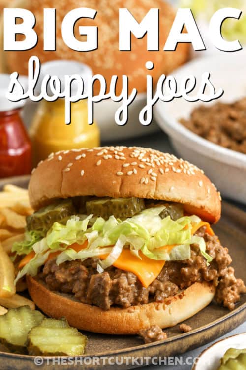 Skip the drive-thru and make Big Mac Sloppy Joes at home in one skillet. Ground beef cooks up fast, then gets tossed in a tangy, creamy sauce made with Thousand Island dressing, ketchup, and mustard. Serve on hamburger buns with pickles, shredded lettuce, and melty American cheese. This copycat Big Mac Sloppy Joes recipe is perfect for busy weeknights and game day. #theshortcutkitchen big mac sloppy joes on a plate and writing