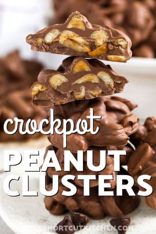 These Crockpot peanut clusters are a rich Christmas candy that’s simple to make and perfect for gifting. The slow cooker melts chocolate and almond bark effortlessly, while roasted peanuts add crunch. Scoop onto wax paper for festive treats that store well and fit perfectly on any holiday dessert tray. #theshortcutkitchen close up of a stack of Crockpot Peanut Clusters with a title