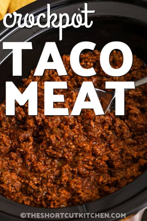This Crockpot taco meat is made with lean ground beef, taco seasoning, and your favorite salsa. This makes a bold, flavorful taco filling that requires almost no prep. It cooks tender and juicy, making it perfect for tacos, nachos, burrito bowls, salads, or meal prep. A simple three-ingredient recipe that stretches to feed a crowd, and makes weeknight dinners incredibly easy. #theshortcutkitchen close up of Crockpot Taco Meat in the crockpot with a title
