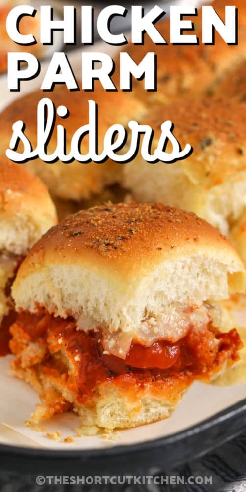 chicken parm sliders in a pan with writing