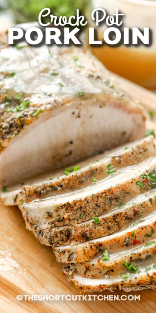 This Crock Pot Pork Loin is the ultimate easy comfort food dinner. Pork loin is rubbed with Italian seasoning and garlic, then slow-cooked over sliced onions in a cozy mix of cider and chicken broth until fork-tender and juicy. Serve this Slow Cooker Pork Loin with mashed potatoes or rice, and spoon the sweet, savory pan juices over everything for a simple meal that tastes absolutely delicious. #theshortcutkitchen crock pot pork loin on a cutting board with text