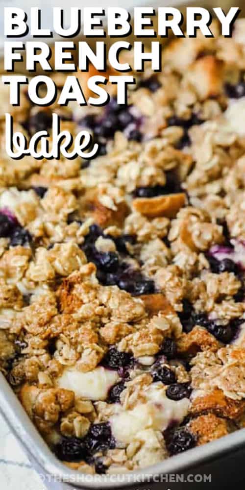 Blueberry French toast bake offers a delightful combination of sweet custard with cream cheese and bright blueberries that transform into a moist and fluffy casserole as it is baked to perfection. Its overnight convenience helps make morning prep simple while providing a friendly option for family brunches. The comforting flavor suits holiday gatherings, weekend treats, or any moment needing a warm, inviting dish. #theshortcutkitchen close up of tasty Blueberry French Toast Bake with writing