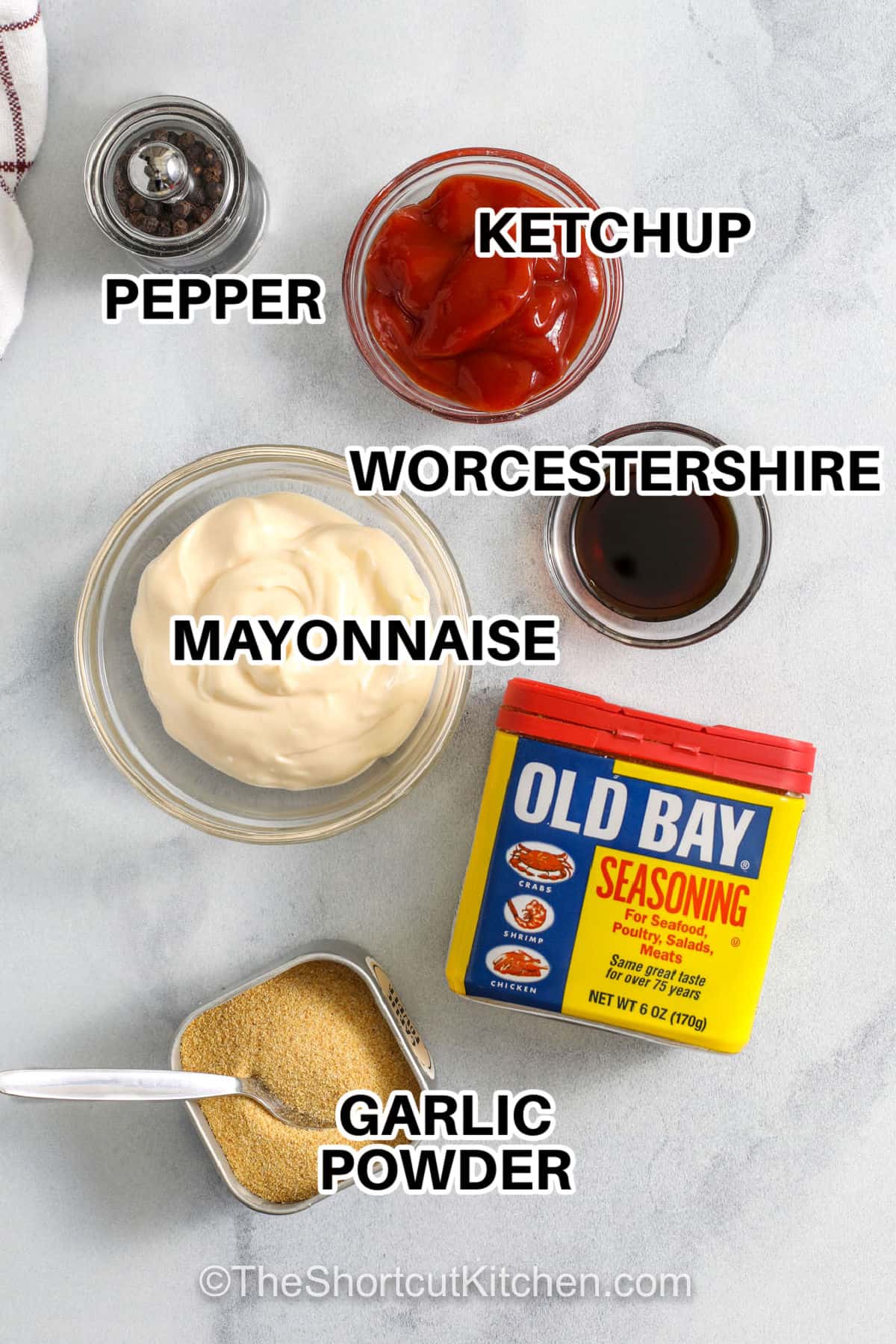 Creamy, tangy, and peppery, this homemade canes sauce tastes like a Raising Cane’s sauce copycat without any fuss. Mix mayo, ketchup, Worcestershire, garlic powder, pepper, and optional Old Bay in one bowl and chill. Use it as a dipping sauce for chicken tenders, fries, nuggets, and sliders for an easy comfort-food win. #theshortcutkitchen pepper , ketchup , worcestershire , mayonnaise , old bay seasoning and garlic powder with labels to make Cane Sauce