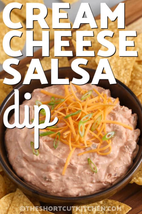 When you need a fast snack for a party or game day, this cream Cheese Salsa Dip takes just minutes to mix using cream cheese and salsa. A short chill helps it thicken so it holds up well for scooping. Choose a restaurant-style chunky salsa for good texture. Finish with cheddar cheese and green onions for color and flavor, or mix in diced jalapeños to turn up the spice. It is simple, quick, and always a hit. #theshortcutkitchen bowl of Cream Cheese Salsa Dip with title