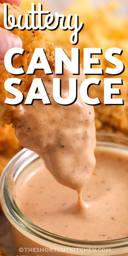 Make viral canes sauce at home with mayonnaise, ketchup, Worcestershire sauce, garlic powder, pepper, and a pinch of Old Bay. This Raising Cane’s sauce copycat is creamy, tangy, and perfect as a chicken finger sauce for dipping tenders, nuggets, and fries. Stir in one bowl, chill, then serve cold for the best flavor. #theshortcutkitchen dipping chicken tenders in Canes Sauce with a title