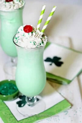 glasses of Shamrock Shake Recipe with whipped cream and a cherry on top