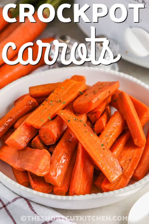 Make crockpot carrots with just 5 ingredients, fresh carrots, butter, brown sugar, and cinnamon for a warm, sweet-savory glaze. These slow cooker carrots are a true shortcut recipe that frees up stovetop space and still tastes special. Great for potlucks, Thanksgiving-style meals, or weeknight mains like meatloaf. Store and reheat easily for meal prep. #theshortcutkitchen plated Crockpot Carrots with a title