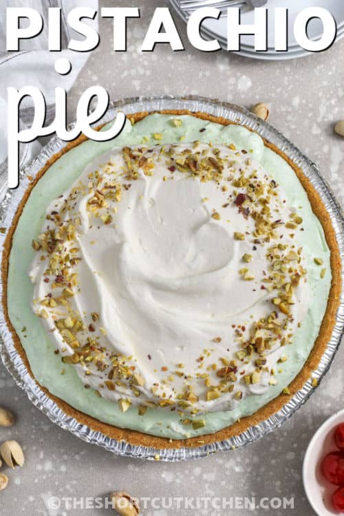 If you love easy desserts, pistachio pie is a must. This no bake pistachio pie combines instant pistachio pudding, cold milk, cream cheese, and whipped topping for a fluffy pistachio cream pie feel without baking. Use a premade graham crust to save time, chill for a few hours, and serve with pistachios or cherries. Perfect for spring celebrations and potlucks. #theshortcutkitchen Pistachio Pie with a title