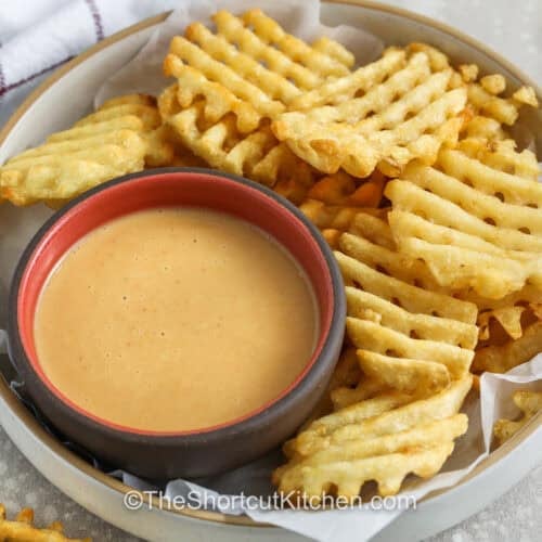chick-fil-a sauce recipe in a bowl with a side of waffle fries for dipping