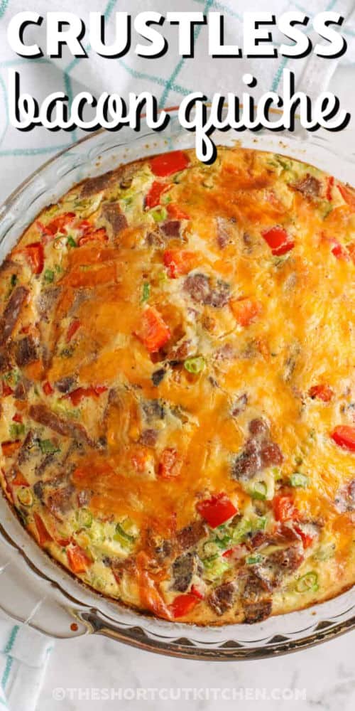 quiche in a pie plate with writing