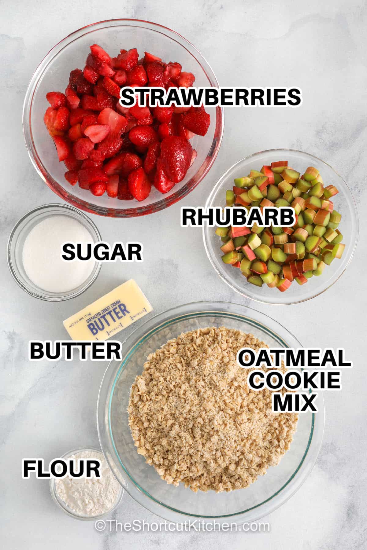 Strawberry rhubarb crisp brings bright fruit flavor and a crisp topping together in one easy dessert. Fresh or frozen fruit works well, making it a flexible recipe you can enjoy any time. The topping bakes up golden and pairs perfectly with the sweet and tart filling. This homemade fruit crisp is simple to prepare and always a crowd favorite. It is perfect for family dinners or sharing with friends when you want something comforting and delicious. #theshortcutkitchen strawberries , rhubarb , sugar , butter , oatmeal cookie mix , flour with labels to make Strawberry Rhubarb Crisp