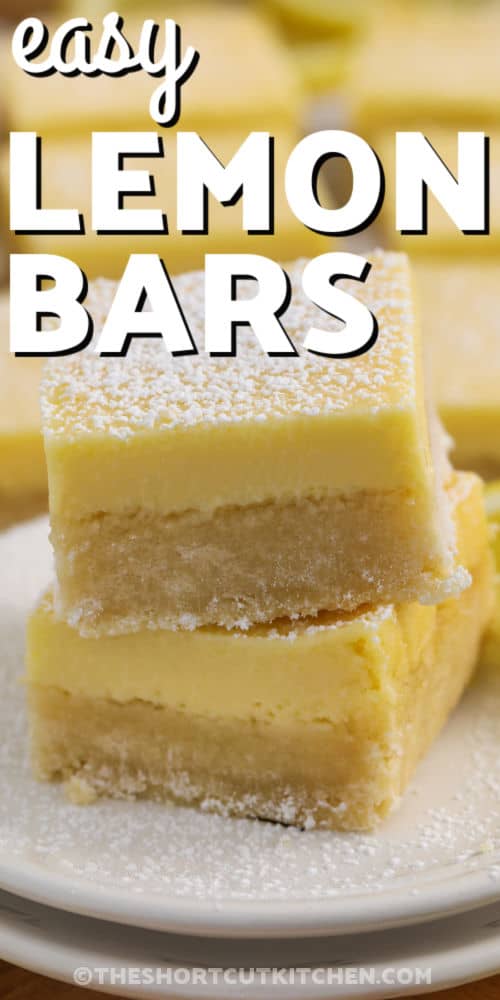 Easy lemon bars bring big citrus flavor without extra work. A cookie mix crust keeps things easy, while fresh lemon juice adds a bright, sweet tart taste to the creamy filling made with condensed milk. Once baked and chilled, they are finished with powdered sugar for a classic dessert that is easy to share and always a hit. They are a great choice when you want something simple but still full of flavor. #theshortcutkitchen Easy Lemon Bars on a plate with writing