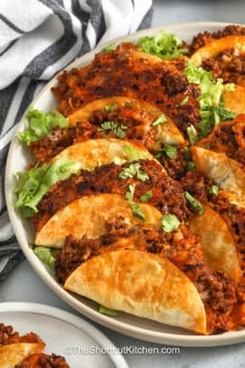 cheesy Baked Tacos on a plate