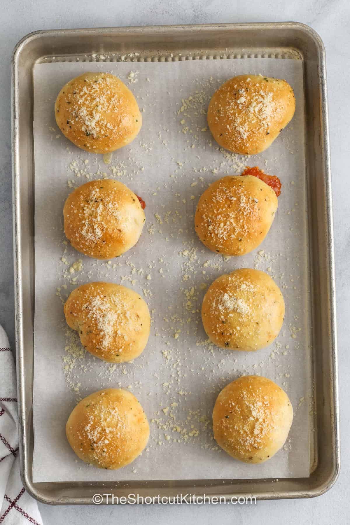 top view of pizza bombs on a pan