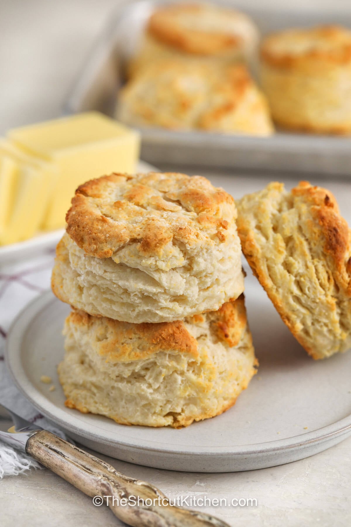 Love easy homemade bread? 7up biscuits are a fun shortcut for serving warm biscuits with your favorite meals. Bisquick keeps the recipe simple, while sour cream and grated butter help create fluffy, flavorful biscuits. They are delicious with breakfast, comforting alongside soup, and perfect with sausage gravy. With simple ingredients and little fuss, this recipe is great for busy days and family dinners. Save this 7up biscuits recipe and make it soon. #theshortcutkitchen plated 7up Biscuits