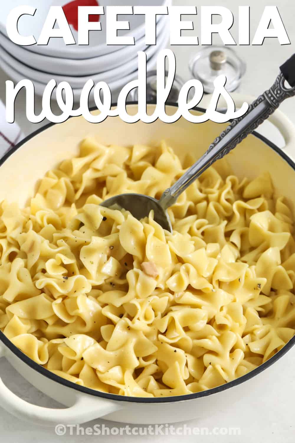 If you love classic comfort food, cafeteria noodles are a must try recipe for your dinner table. These creamy noodles have a savory chicken flavor and a buttery texture that makes them the perfect side dish for so many meals. Serve them alongside your favorite meats or enjoy them as a cozy addition to your family recipes. Save this easy noodle recipe and make it for your next meal. #theshortcutkitchen pot of Cafeteria Noodles with a title