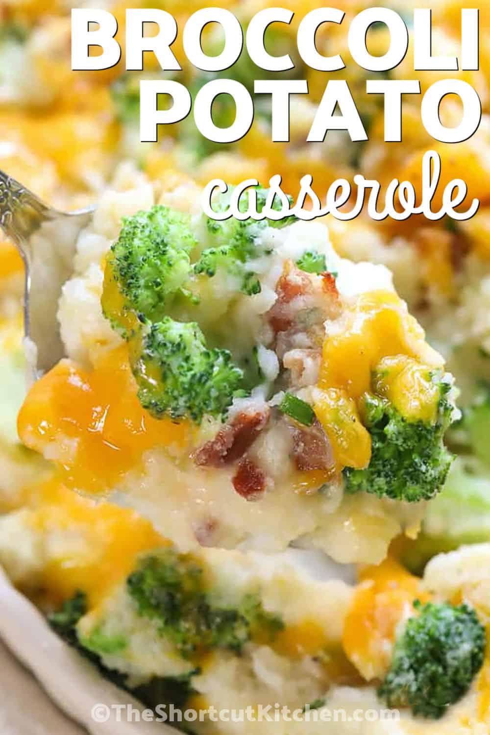 Make this easy broccoli potato casserole when plain mashed potatoes need a cheesy upgrade. Tender broccoli florets, smoky bacon, cream cheese, and sharp cheddar are mixed into fluffy mashed potatoes and baked in a casserole dish. This loaded potato casserole with broccoli is hearty enough for a casual supper but special enough for a holiday table. Pin the recipe and add it to this week’s dinner plan. #theshortcutkitchen cheesy Broccoli Potato Casserole with a title