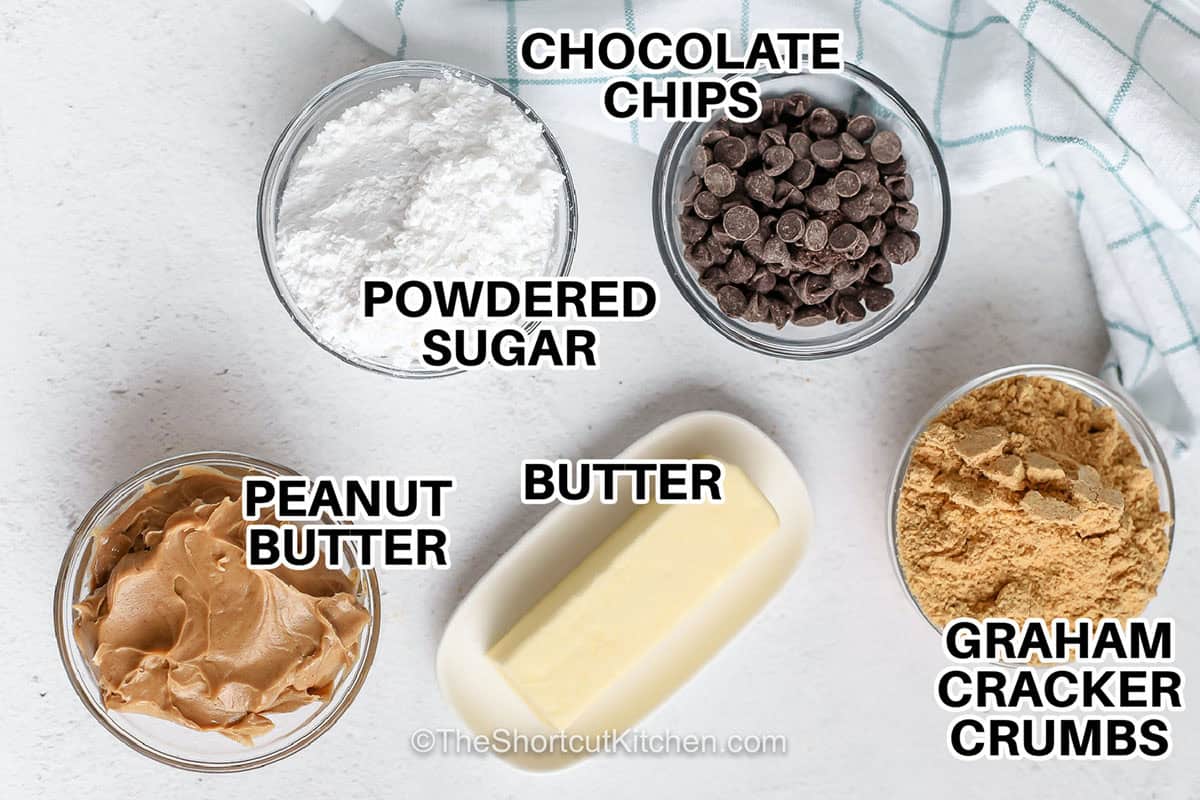 This peanut butter bars recipe combines creamy peanut butter, buttery graham cracker crumbs, powdered sugar, and a silky chocolate topping into an easy no-bake dessert. Perfect for holidays, potlucks, parties, or an everyday sweet treat, these bars slice beautifully after chilling and freeze well for make-ahead desserts. Save this easy recipe for your next dessert tray. #theshortcutkitchen chocolate chips , graham cracker crumbs , butter , powdered sugar , creamy peanut butter and labels to make Peanut Butter Bars