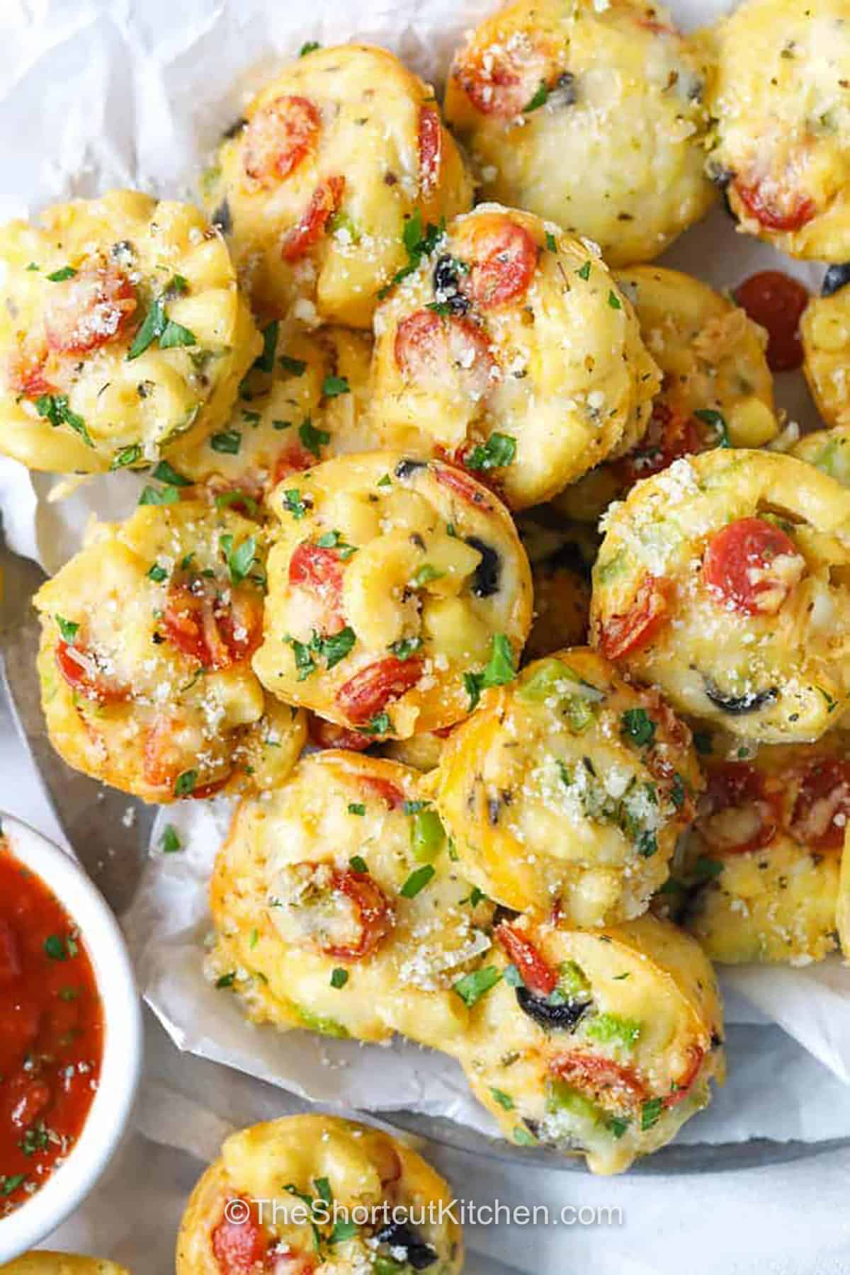 plated Mac and Cheese Pizza Bites with pizza sauce