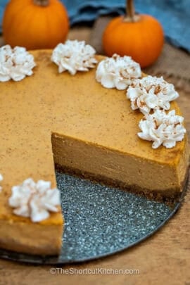 Pumpkin Pie Cheesecake with a slice taken out