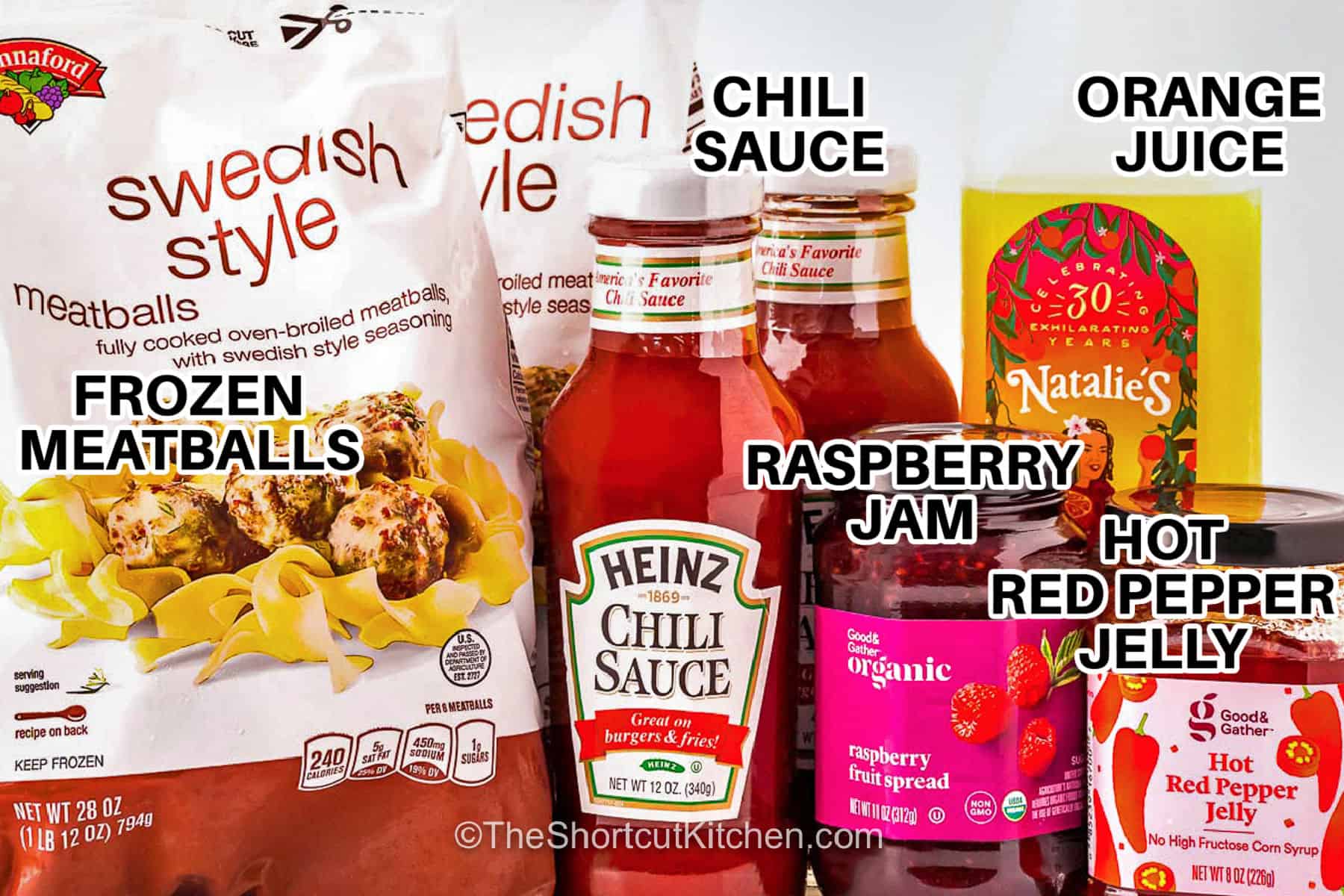 For an easy party favorite, pepper jelly meatballs are hard to pass up. Tender frozen meatballs soak up a rich sauce made with raspberry jam, chili sauce, orange juice, and hot pepper jelly. Each bite has a delicious blend of sweet, tangy, and spicy flavors that keeps everyone coming back. Serve them with toothpicks for an effortless appetizer that is perfect for sharing. Add this crowd-pleasing recipe to your next gathering. #theshortcutkitchen frozen meatballs , chili sauce , raspberry jam , orange juice , hot red pepper jelly with labels to make Pepper Jelly Meatballs.