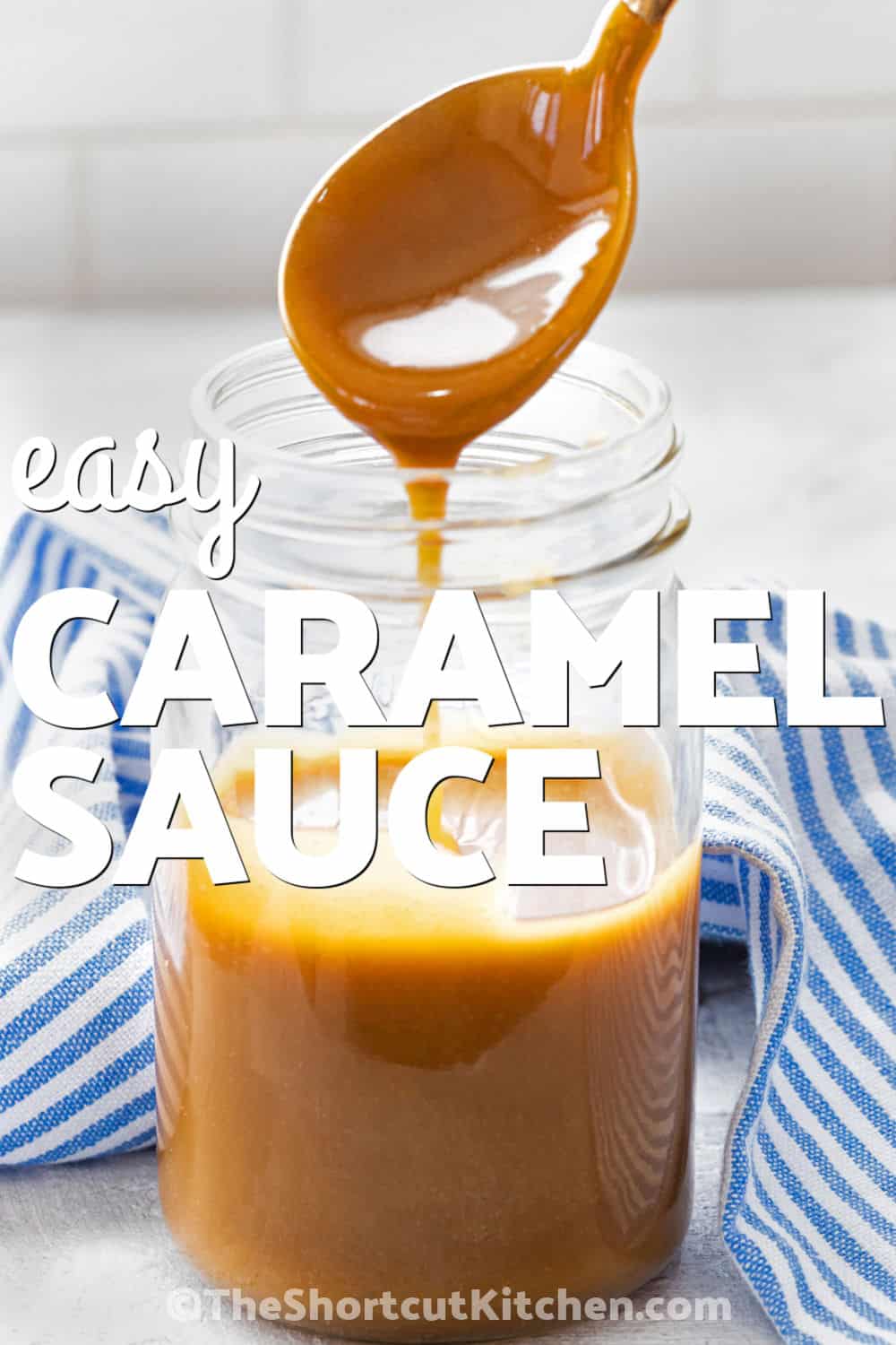 Easy caramel sauce is a simple 3 ingredient recipe made with brown sugar, butter, and milk. Everything cooks together in one saucepan for a rich, smooth caramel sauce that's easy enough for beginner cooks. Serve it warm as an ice cream topping, drizzle it over brownies, or pair it with apples and fall desserts. Keep this homemade brown sugar caramel sauce handy and pin the recipe today. #theshortcutkitchen Easy Caramel Sauce in a jar with a spoon and a title.