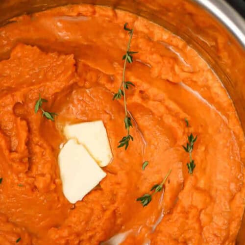 Instant Pot Mashed Sweet Potatoes with butter on top.